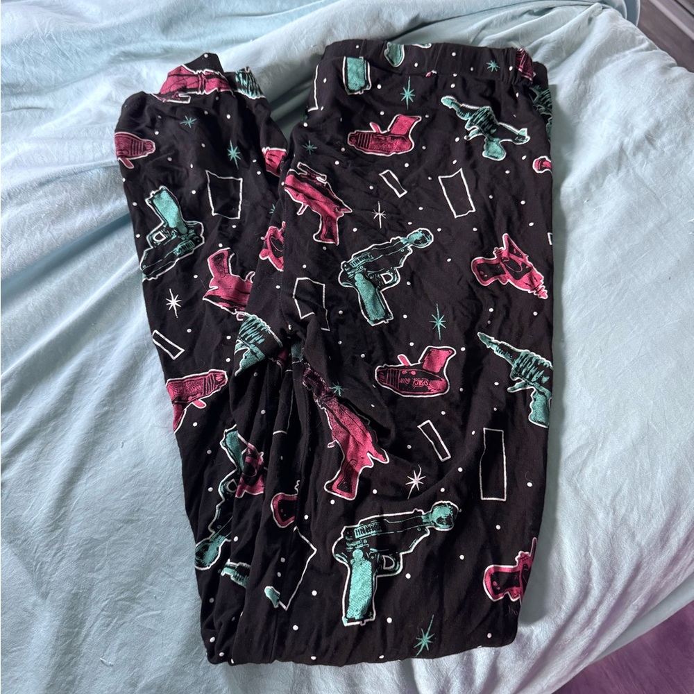 Sourpuss Black Leggings with Pink and Teal ray gun print